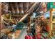Large attic featuring wooden floor and ample storage space for organization and accessibility at 103 Se Tuscawilla Ave, Ocala, FL 34471