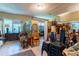 Spacious basement area showcasing tile flooring and natural light at 103 Se Tuscawilla Ave, Ocala, FL 34471