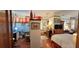Spacious bedroom with kitchenette and charming vintage decor at 103 Se Tuscawilla Ave, Ocala, FL 34471