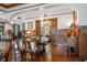 Elegant dining room showcasing beautiful woodwork and a glimpse into the adjoining rooms at 103 Se Tuscawilla Ave, Ocala, FL 34471
