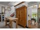 Spacious kitchen featuring an island, ample cabinetry, stainless steel appliances, and nearby staircase at 103 Se Tuscawilla Ave, Ocala, FL 34471