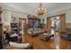 Inviting living room with period details, showcasing comfortable furniture and classic decor at 103 Se Tuscawilla Ave, Ocala, FL 34471