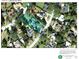 Aerial view of property showing the lot dimensions, surrounding neighborhood, and proximity to Lake of Wales at 1127 S Lakeshore Blvd, Lake Wales, FL 33853