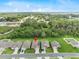 Real estate aerial view shows house, landscaping, and neighborhood at 1274 Pintail Pl, Lakeland, FL 33813