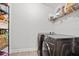 A functional laundry room featuring modern washer and dryer units at 1274 Pintail Pl, Lakeland, FL 33813