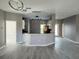 Open concept kitchen area with pendant lighting and modern finishes at 130 Prima Dr, Kissimmee, FL 34759