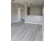 View of living room with doorways leading to other parts of the home at 130 Prima Dr, Kissimmee, FL 34759