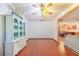 Spacious living room with beautiful flooring and a blue china cabinet at 1317 Avenue A Se, Winter Haven, FL 33880