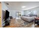 The bedroom features a slider to the porch, wood-look floors, and neutral paint at 1317 Avenue A Se, Winter Haven, FL 33880