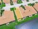 Aerial view of a home highlighting the proximity to a beautiful pond and manicured green spaces at 1349 Innsbruck Ct, Winter Haven, FL 33884
