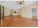 Spacious living room boasts laminate floors, neutral paint colors, and ample natural light at 1349 Innsbruck Ct, Winter Haven, FL 33884