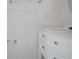 Close-up of a half-bath featuring a white vanity, sink, and contemporary fixtures at 137 Piave St, Haines City, FL 33844