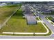 Aerial view of a two-story home featuring a spacious lawn at 137 Piave St, Haines City, FL 33844