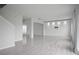 Spacious living room featuring sleek tiled floors, recessed lighting, and ample natural light at 137 Piave St, Haines City, FL 33844
