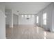 Bright living room with tiled floors, recessed lights, and neutral colors offers a modern feel at 137 Piave St, Haines City, FL 33844