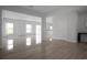 Open concept living space with abundant natural light and seamless flow to the outdoor patio at 137 Piave St, Haines City, FL 33844