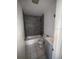 Bathroom featuring tub, tile wall, sink, and toilet at 1506 Fairbanks St, Lakeland, FL 33805