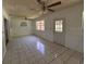 Open bonus room with tile flooring and lots of natural light from windows at 1506 Fairbanks St, Lakeland, FL 33805