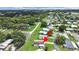 Aerial shot of a cozy home nestled in a quiet residential neighborhood at 1548 Longbow Dr, Lakeland, FL 33810