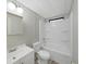 This bright bathroom offers essential fixtures in a compact space, maximizing functionality and style at 1548 Longbow Dr, Lakeland, FL 33810
