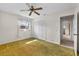 Cozy bedroom with a view from its dual windows at 165 Lagoon Rd, Winter Haven, FL 33884