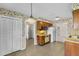 Classic kitchen with yellow countertops, linoleum flooring, ample storage, and essential appliances at 165 Lagoon Rd, Winter Haven, FL 33884