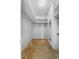 Functional walk-in closet with carpeted floor, built-in shelving, and a full-length mirror at 165 Lagoon Rd, Winter Haven, FL 33884