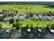 Scenic view of a luxurious community with waterfront access and private dock, capturing upscale living at 1836 Woodpointe Dr, Winter Haven, FL 33884