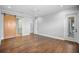 Spacious primary bedroom with barn door access to the bathroom and outdoor access at 1836 Woodpointe Dr, Winter Haven, FL 33884