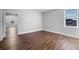 Bedroom with wood flooring, large windows, and ample natural light at 1836 Woodpointe Dr, Winter Haven, FL 33884