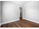 Clean bedroom with hardwood floors and simple design at 1836 Woodpointe Dr, Winter Haven, FL 33884