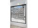 The shower features modern tile and a glass sliding door for a sleek look at 1836 Woodpointe Dr, Winter Haven, FL 33884
