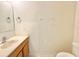 Bathroom with a white sink and toilet at 1844 Emily Dr, Winter Haven, FL 33884