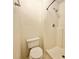 Bathroom featuring a white toilet and stand up shower at 1844 Emily Dr, Winter Haven, FL 33884