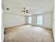 Spacious bedroom features a ceiling fan and natural lighting at 1844 Emily Dr, Winter Haven, FL 33884