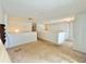 Second floor hallway with natural light and white railings at 1844 Emily Dr, Winter Haven, FL 33884
