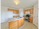 Functional kitchen features an island, stainless steel appliances and abundant storage at 1844 Emily Dr, Winter Haven, FL 33884
