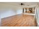 Open-concept living room boasts hardwood floors and ample natural light at 1844 Emily Dr, Winter Haven, FL 33884