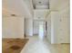 Spacious living room with high ceilings and tile and carpeted floors at 1844 Emily Dr, Winter Haven, FL 33884