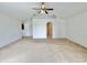Large living room with vaulted ceiling and ample space at 1844 Emily Dr, Winter Haven, FL 33884