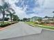 Street view of the community, showcasing well-maintained landscaping and various home styles at 1844 Emily Dr, Winter Haven, FL 33884