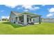 Backyard featuring a patio and spacious yard at 195 Kissengen Park Blvd, Bartow, FL 33830