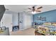 bedroom with ample closet space, play area, and ceiling fan at 195 Kissengen Park Blvd, Bartow, FL 33830