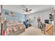 Bedroom features a ceiling fan, carpet, and window with horizontal blinds at 195 Kissengen Park Blvd, Bartow, FL 33830