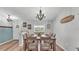 Bright dining room with natural light and a nicely decorated table setting at 195 Kissengen Park Blvd, Bartow, FL 33830