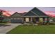 Charming single-Gathering home with beautiful landscaping, covered porch, and attached two car garage at 195 Kissengen Park Blvd, Bartow, FL 33830