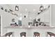 Kitchen with modern pendant lighting over a breakfast bar with seating at 195 Kissengen Park Blvd, Bartow, FL 33830