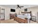 Bright bedroom boasts a modern ceiling fan and a wooden bedroom set at 195 Kissengen Park Blvd, Bartow, FL 33830