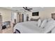 Bright bedroom with a rustic wood bedroom set, fan and ensuite bathroom at 195 Kissengen Park Blvd, Bartow, FL 33830
