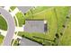 A bird's-eye view reveals this home's layout, with pool, lawn, and its position within the neighborhood at 1976 Harvest Landing Cir, Lakeland, FL 33810